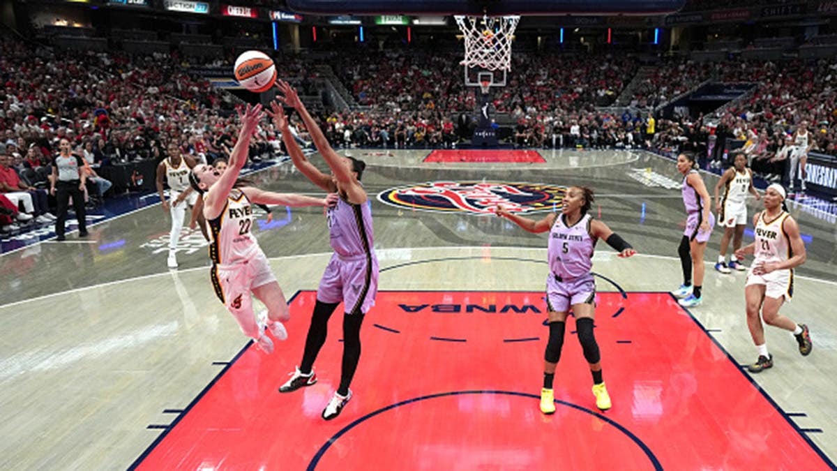 Caitlin Clark drives to the basket against the Golden State Valkyries.