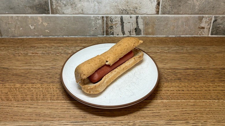 Carbonaut got dog bun with a hot dog in the middle