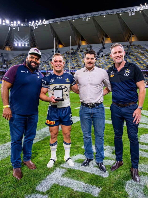 Broncos legend and former teammate of Carl Webb joins Carl Webb Meddalist Reuben Cotter, Carter Webb and Gavin Cooper on field following the XXXX Derby in Townsville.
