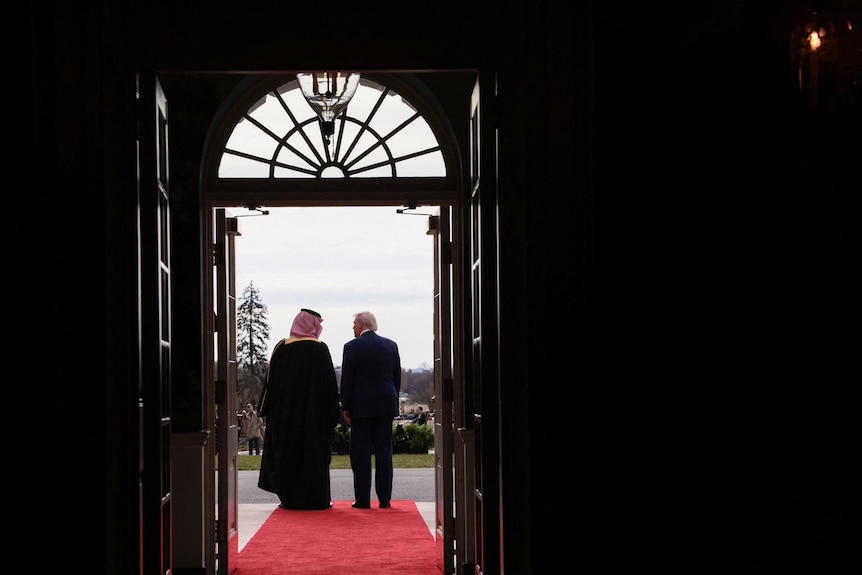 Donald Trump welcomes Saudi Crown Prince on red carpet.