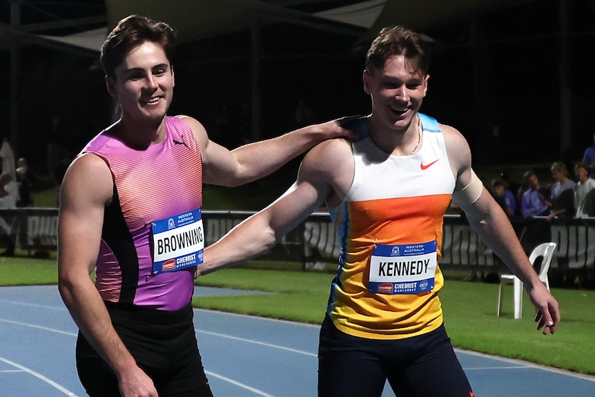 Rohan Browning is congratulated by Lachlan Kennedy.