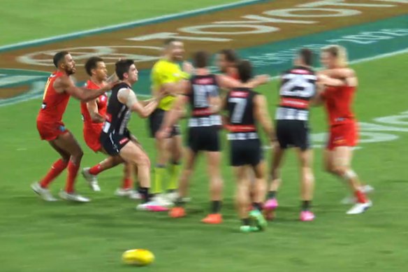 A melee erupted between the Suns and Magpies players at half-time on Saturday night.