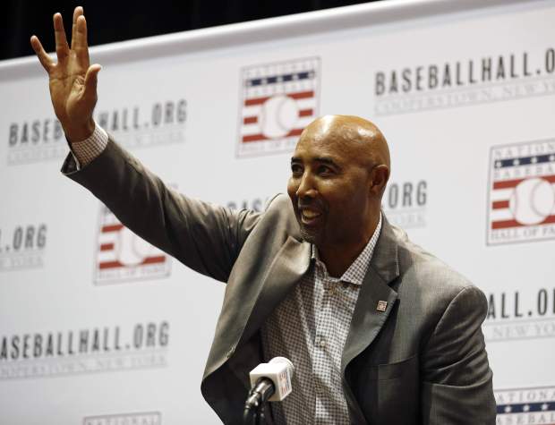 Harold Baines waves during a news conference for the Baseball Hall of Fame at the MLB winter meetings Dec. 10, 2018, in Las Vegas. (AP Photo/John Locher)