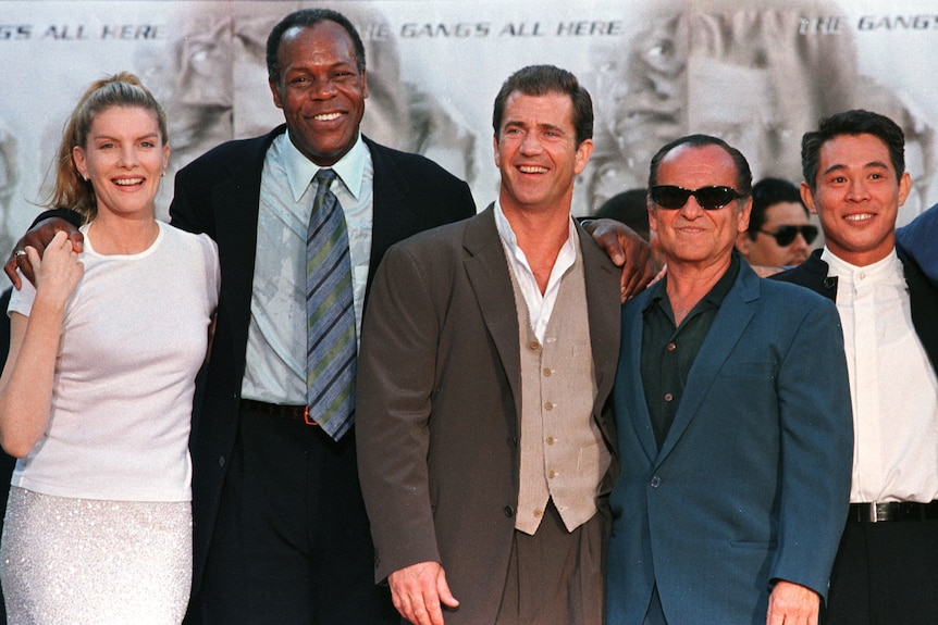 Danny Glover stands with four of his fellow cast members at the Lethal Weapon 4 premiere.