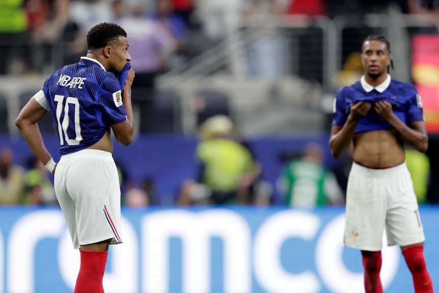 Kylian Mbappe and Michael Olise both look disappointed after defeat
