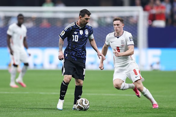 Lionel Messi controls the ball against England in their World Cup semi-final.