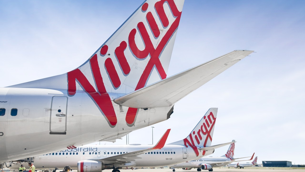 Family of disabled twins sue Virgin Australia after allegedly being refused access to bathroom on Bali flight, claim significant psychological distress