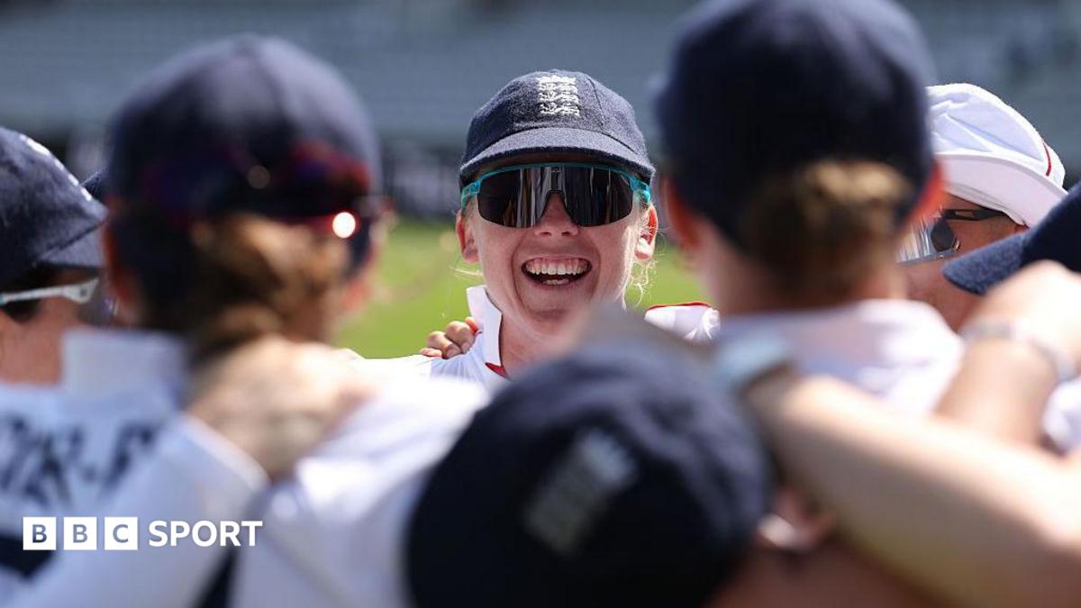 England captain Heather Knight smiles in the England team huddle before the start of play on day three against India at Lord's