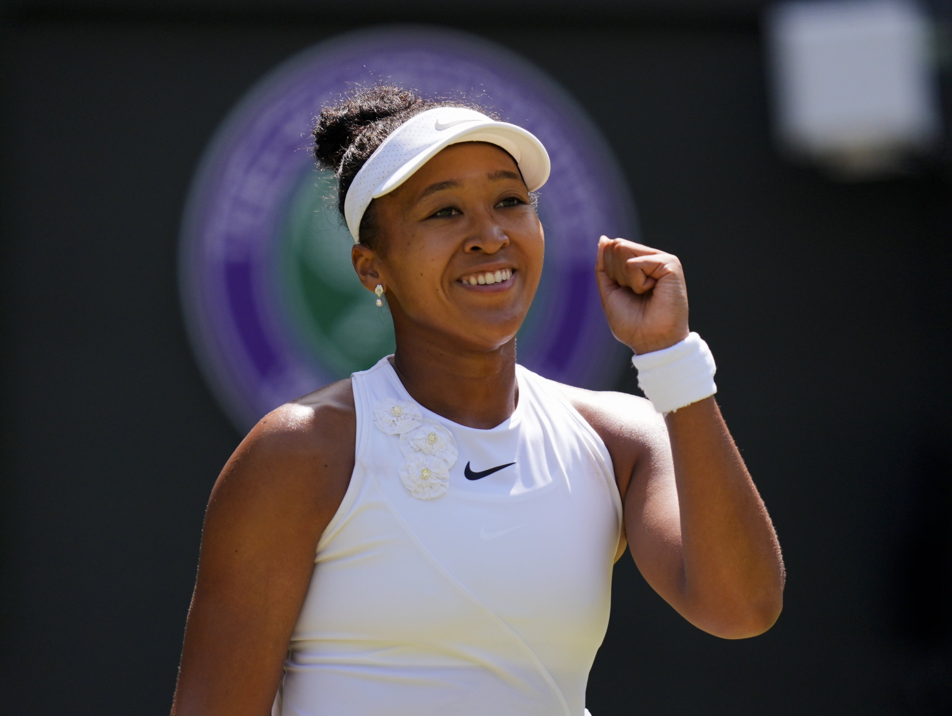 Naomi Osaka, celebrating her win over Daria Kasatkina, is through to the fourth round of Wimbledon for the first time