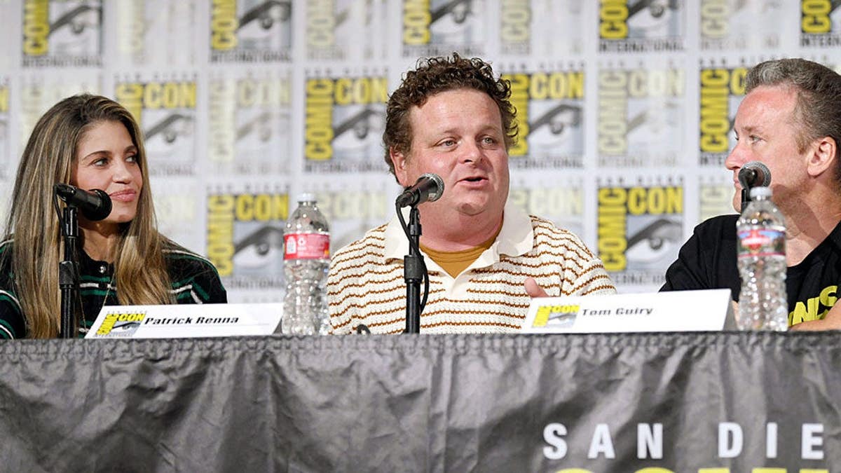 Danielle Fishel, Patrick Renna and Tom Guiry stand together at the Dugout Dads panel.