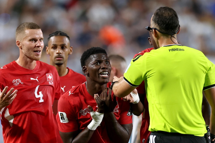 Breel Embolo pleads with the referee