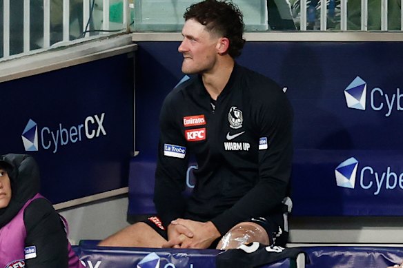 A hamstrung Harry Perryman sits on the bench during Thursday night’s game.