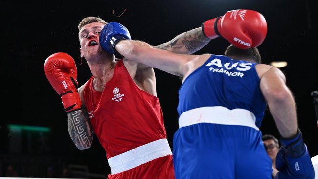 Paul Trainor finds his range before the referee ended his bout against Scot Alan Perrie early.