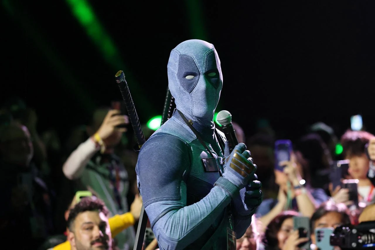 Ryan Reynolds in Deadpool cosplay speaks during Marvel Studios’ presentation at Comic-Con International in San Diego, California, July 25, 2026. (AFP Photo)