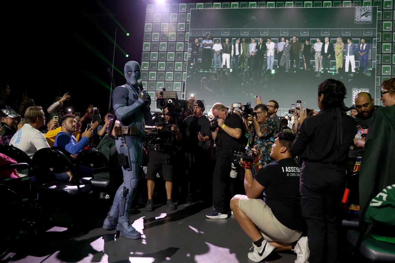 Ryan Reynolds in Deadpool cosplay speaks during Marvel Studios’ presentation at Comic-Con International in San Diego, California, July 25, 2026. (AFP Photo)