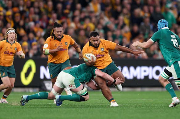 Taniela Tupou takes on the Irish defence at Allianz Stadium.