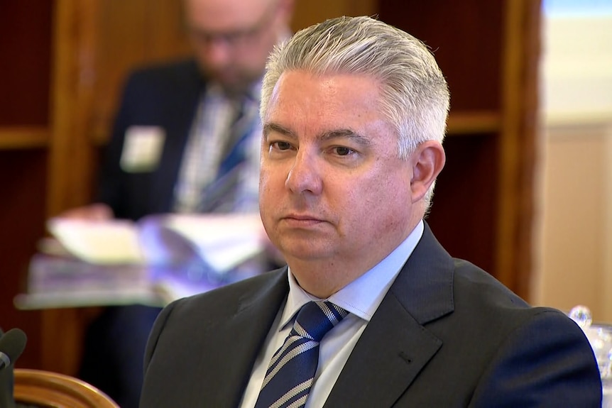 A close up of Mark Cridland at budget estimates.