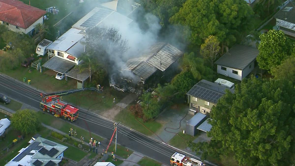 Mother and family friend die as husband and children escape blaze in Kingston