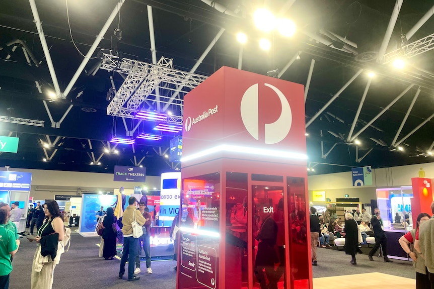 A photo of the different stalls, including Australia Post, at the recent conference.