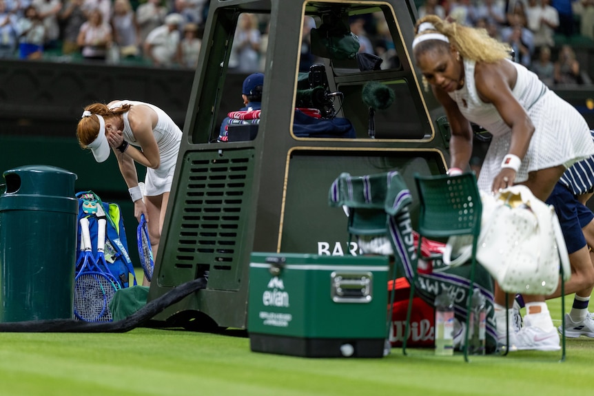 Maya Joint and Serena Williams pack up their bags after their Wimbledon match.