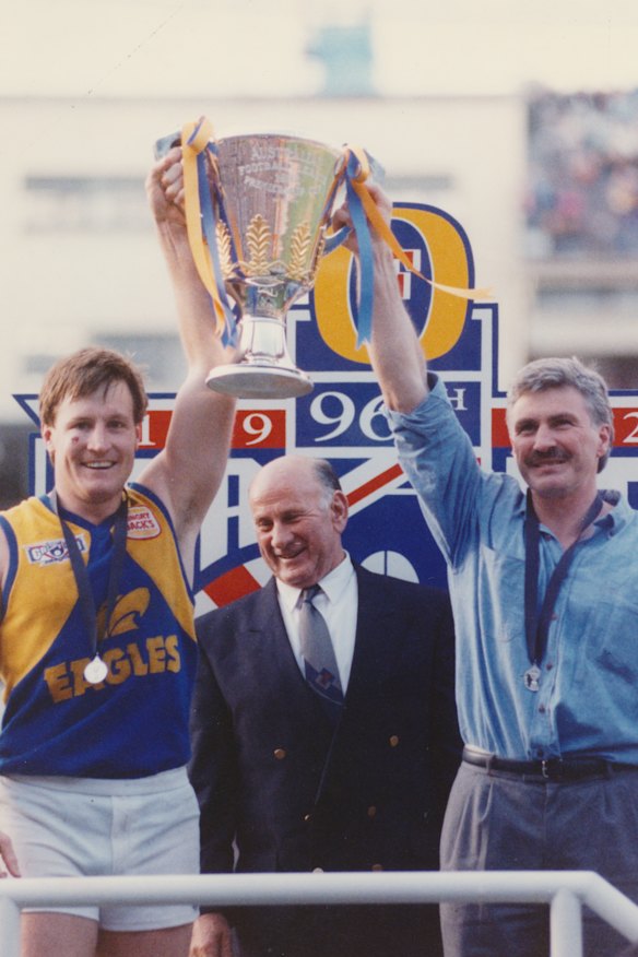 Eagles coach Mick Malthouse (right) holds the 1992 premiership with West Coast captain John Worsfold.