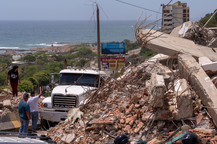 A truck and a large pile of rubble following earthquakes in Venezuela.