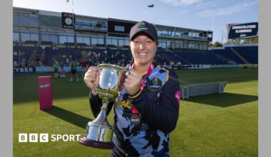 Glamorgan captain Lauren Parfitt lifting the Vitality Women's T20 Blast League 2 trophy after defeating Gloucestershire.