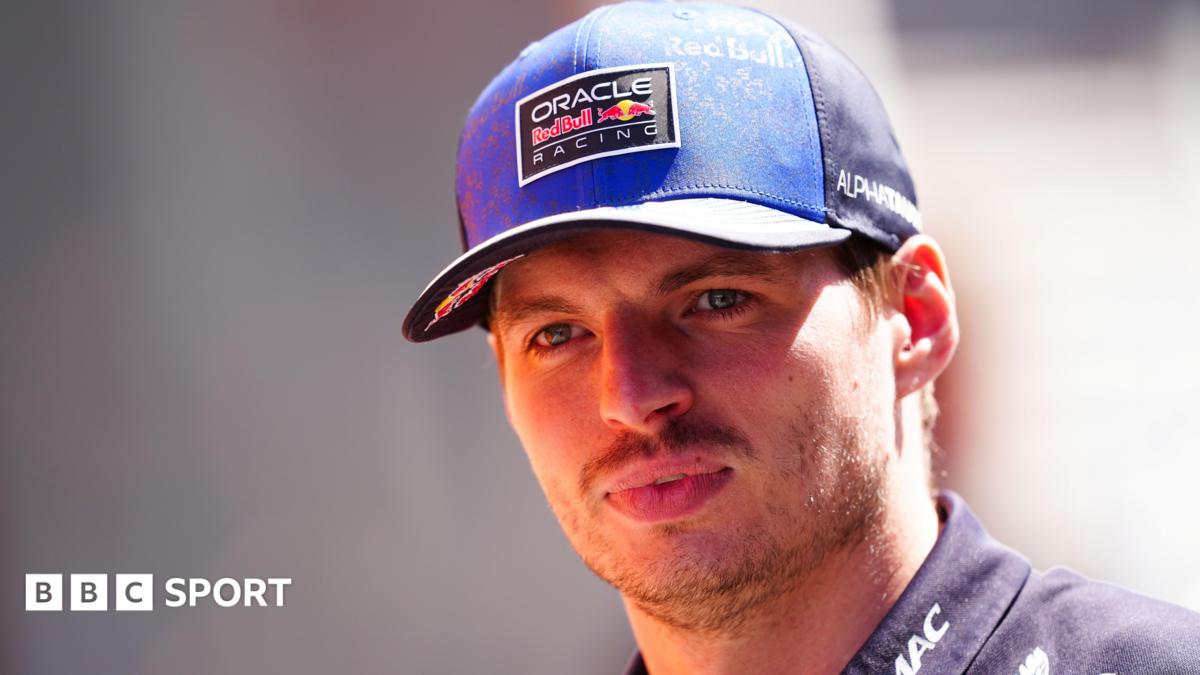 Max Verstappen wearing a Red Bull Racing cap