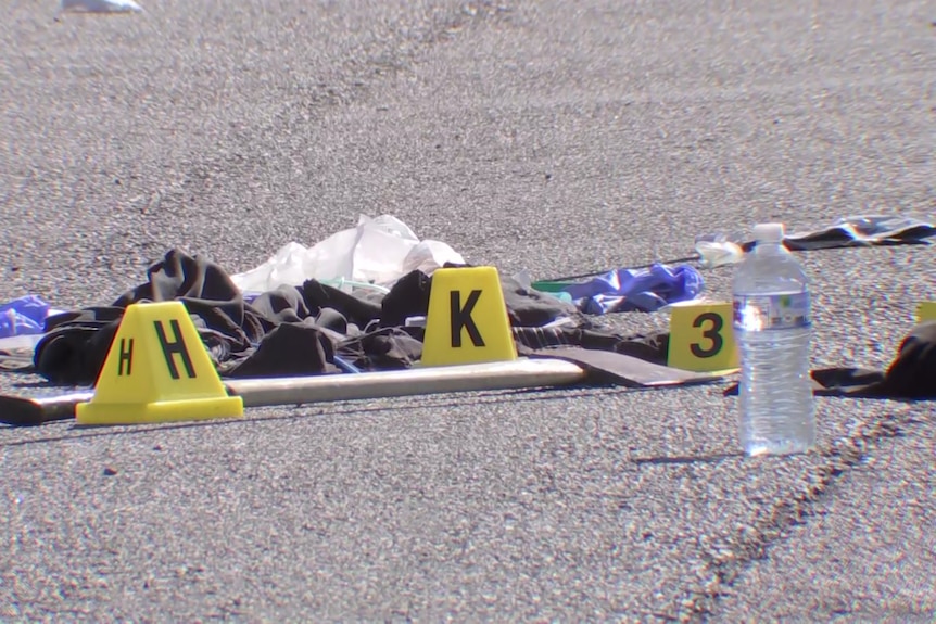 An axe lying at the crime scene of an alleged murder involving a scooter in 2024.