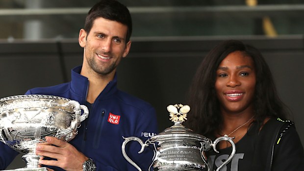 Djokovic and Williams pose with the Australian Open trophies in 2016.