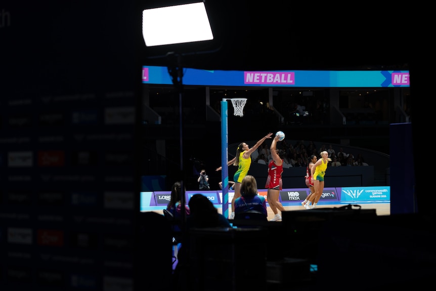 A wide shot of Australian Diamonds defending Tonga in their netball group game at the 2026 Glasgow Commonwealth Games.