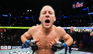 Paddy Pimblett celebrates after winning at UFC 329