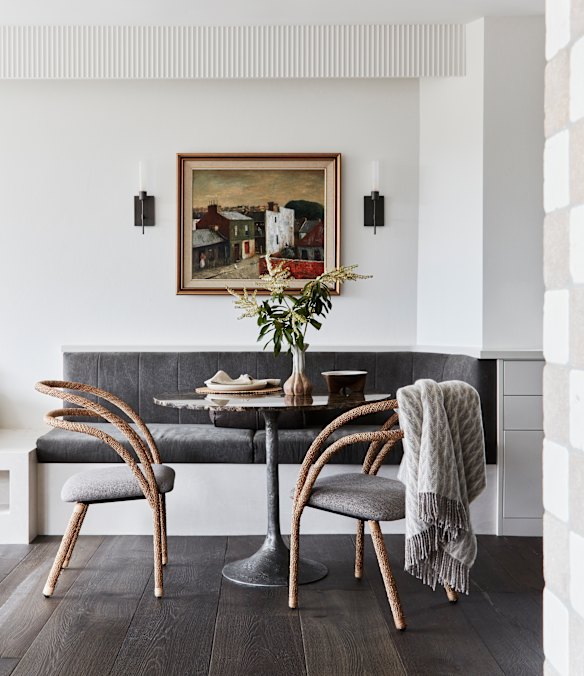 Built-in joinery is a sound choice for small spaces. This dining room designed by Kate Nixon combines a banquette with barely-there chairs to keep the small space uncluttered but still functional.