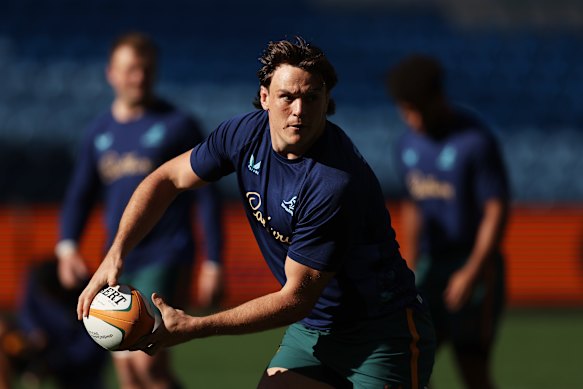 Tom Hooper passes during a Wallabies captain’s run at Allianz Stadium.