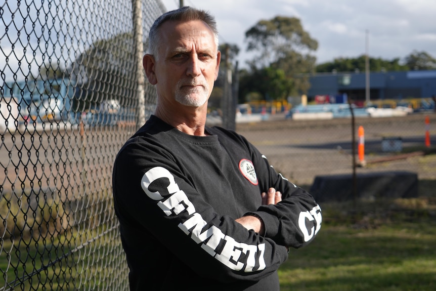 CFMEU delegate Stuart Edward with his arms crossed.