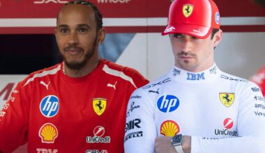 Hamilton smiling with grumpy Leclerc edited next to him in white Ferrari kit holding F1 microphone