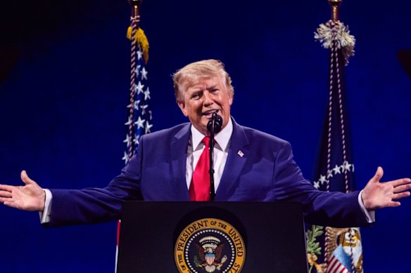 Trump addresses the crowd during the Salute to America event on the National Mall in Washington.