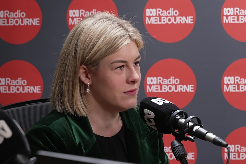 Victorian Opposition leader Jess Wilson sits in front of an ABC radio microphone
