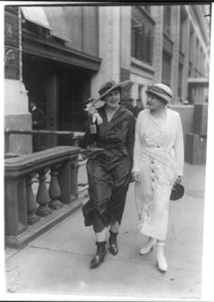 A black and white photo of two women in the 1920s