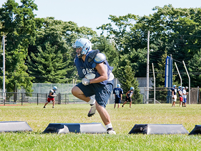 football player running drills