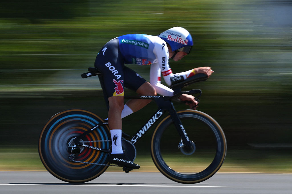 Red Bull - BORA - hansgrohe team's Italian rider Mattia Cattaneo cycles during the 16th stage of the 113th edition of the Tour de France cycling race, 26,1 km time trial between &Eacute;vian-les-Bains and Thonon-les-Bains in the French Alps, on July 21, 2026. (Photo by Anne-Christine POUJOULAT / AFP)