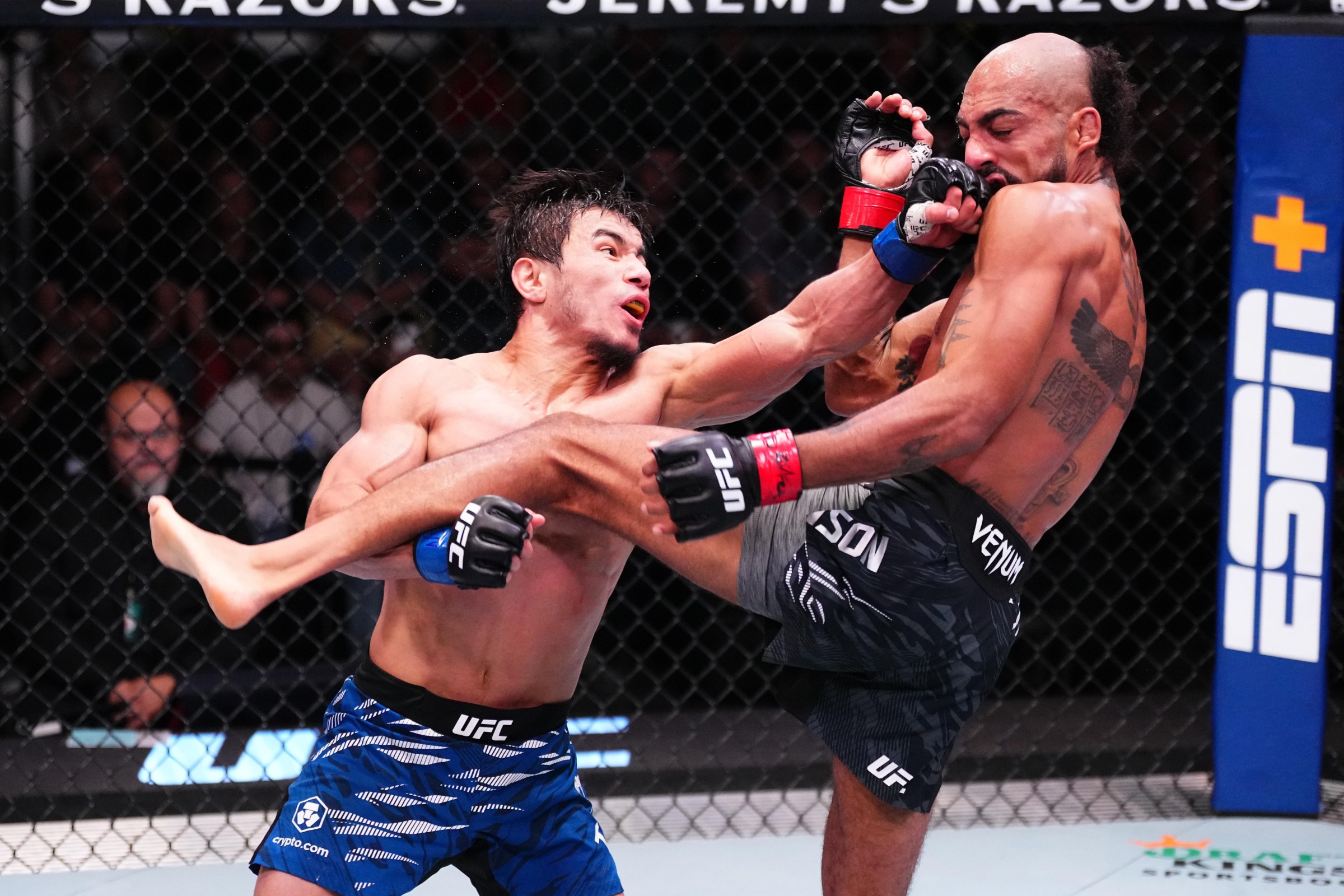 LAS VEGAS, NEVADA - MARCH 01: (L-R) Ramazan Temirov of Uzbekistan punches Charles Johnson in a flyweight fight during the UFC Fight Night event at UFC APEX on March 01, 2025 in Las Vegas, Nevada. (Photo by Jeff Bottari/Zuffa LLC)