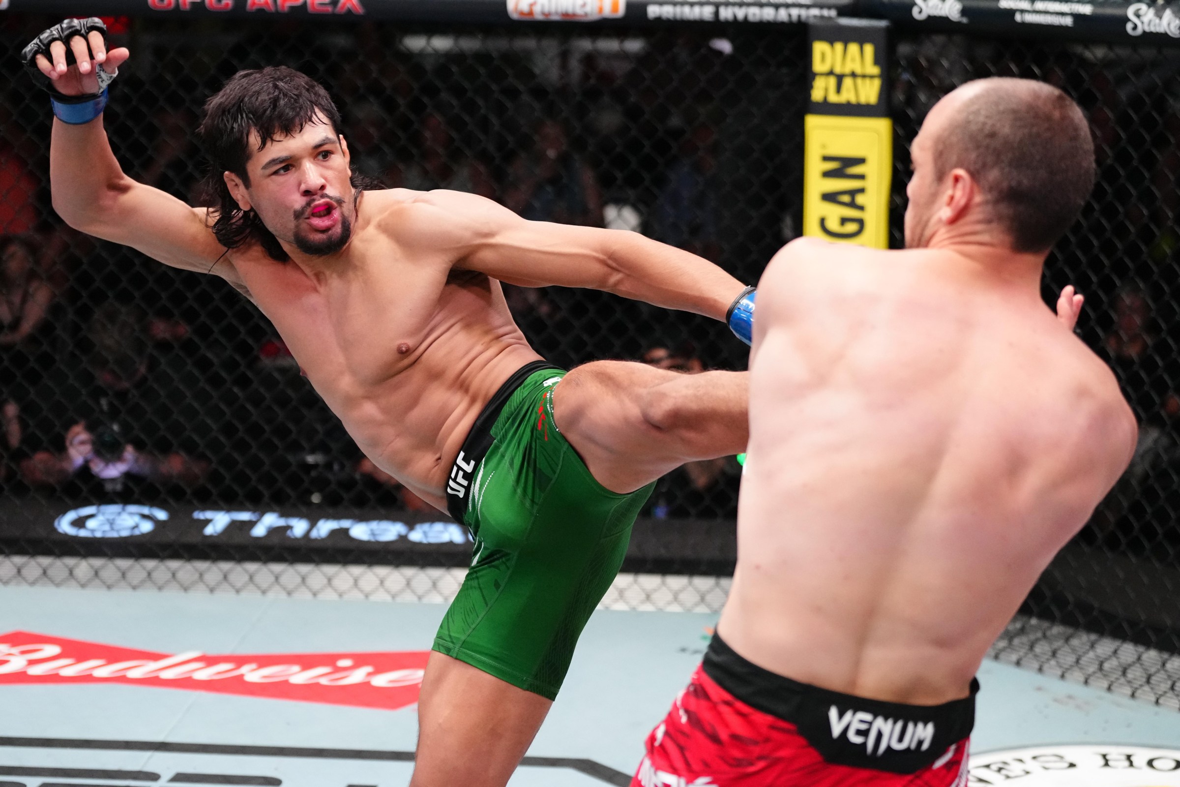 LAS VEGAS, NEVADA - AUGUST 09: (L-R) Gilbert Urbina kicks Uros Medic of Serbia in a welterweight fight during the UFC Fight Night event at UFC APEX on August 09, 2025 in Las Vegas, Nevada. (Photo by Jeff Bottari/Zuffa LLC)