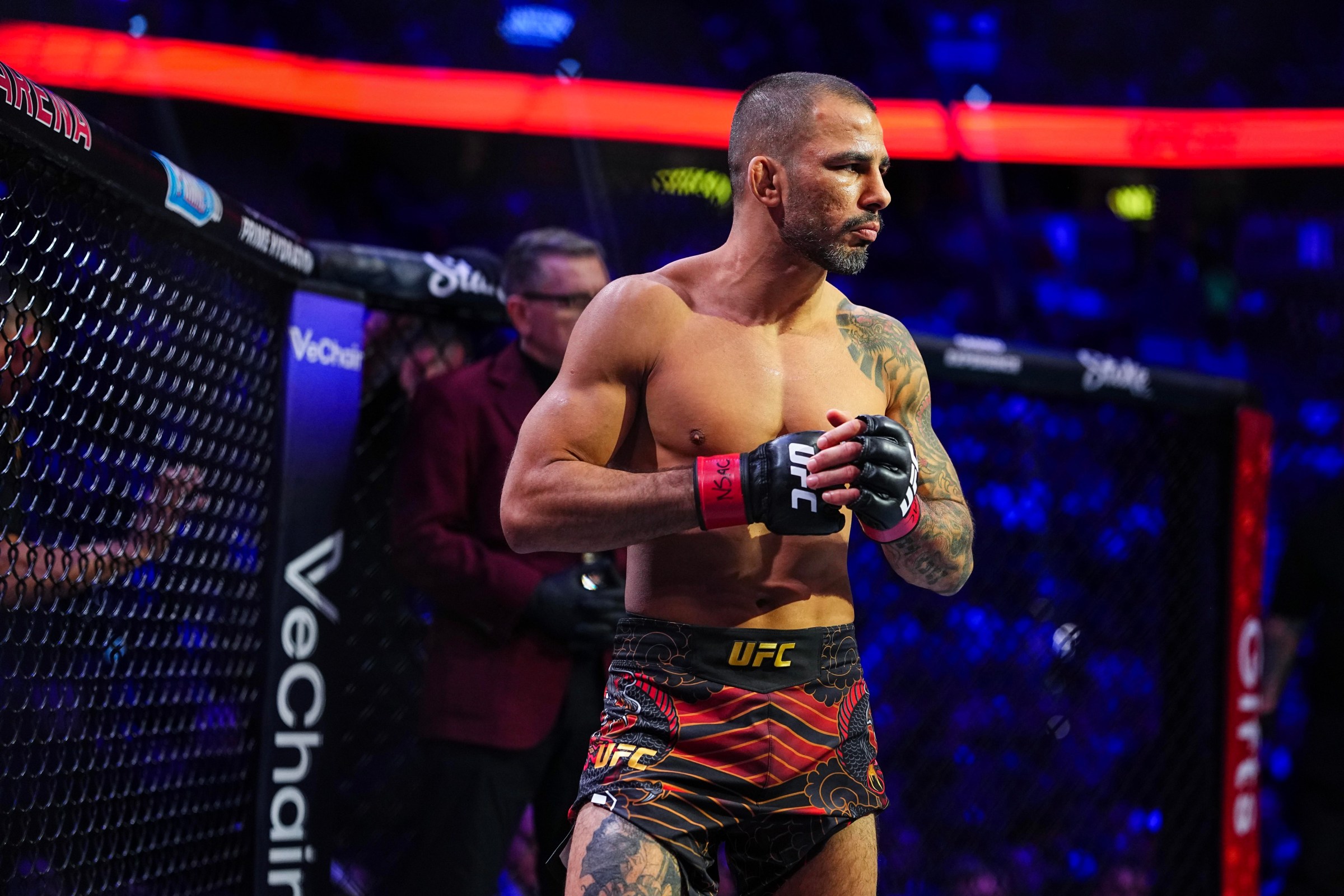 LAS VEGAS, NEVADA - DECEMBER 06: Alexandre Pantoja of Brazil enters the Octagon in the UFC flyweight championship fight during the UFC 323 event at T-Mobile Arena on December 06, 2025 in Las Vegas, Nevada. (Photo by Chris Unger/Zuffa LLC)