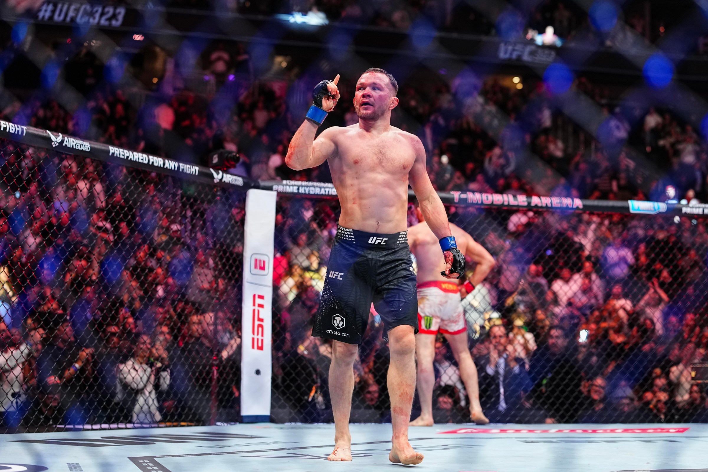 LAS VEGAS, NEVADA - DECEMBER 06: Petr Yan of Russia reacts to the end of the round in the UFC bantamweight championship fight during the UFC 323 event at T-Mobile Arena on December 06, 2025 in Las Vegas, Nevada. (Photo by Chris Unger/Zuffa LLC)