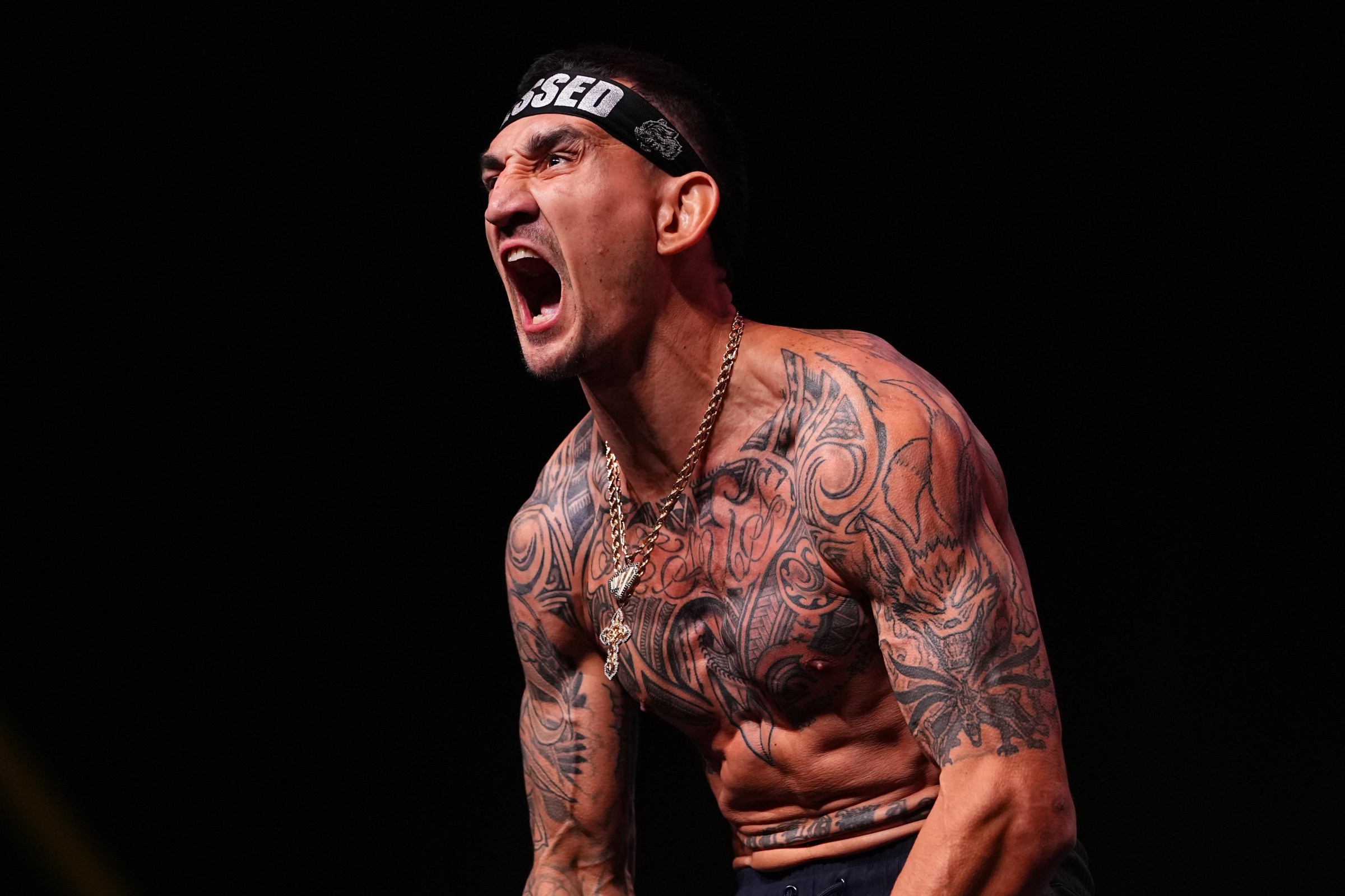 LAS VEGAS, NEVADA - MARCH 06: Max Holloway poses on the scale during the UFC 326 ceremonial weigh-in at MGM Grand Garden Arena on March 06, 2026 in Las Vegas, Nevada. (Photo by Chris Unger/Zuffa LLC)