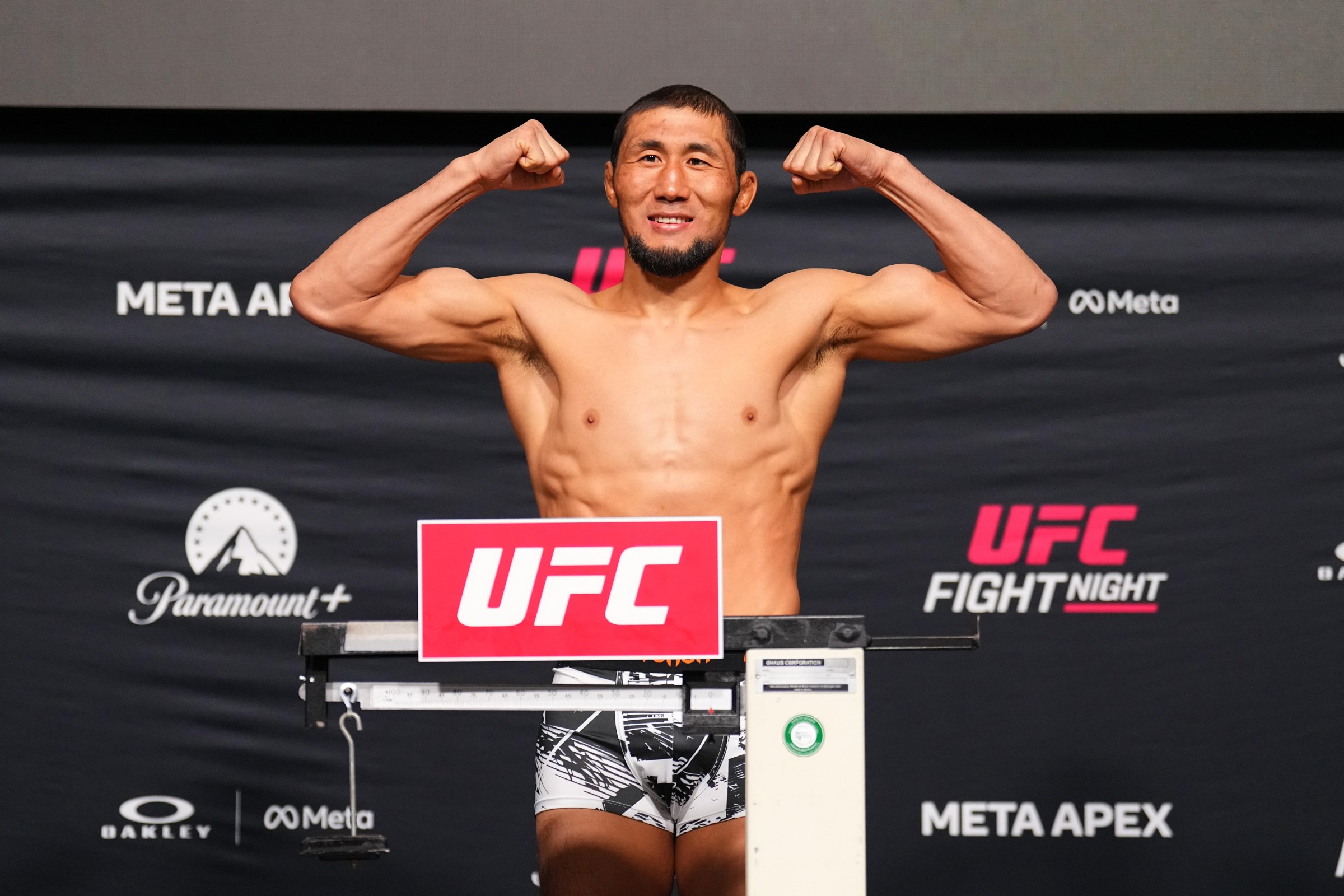LAS VEGAS, NEVADA - MARCH 13: Myktybek Orolbai of Kyrgyzstan poses on the scale during the UFC Fight Night official weigh-ins at Meta APEX on March 13, 2026 in Las Vegas, Nevada. (Photo by Chris Unger/Zuffa LLC)