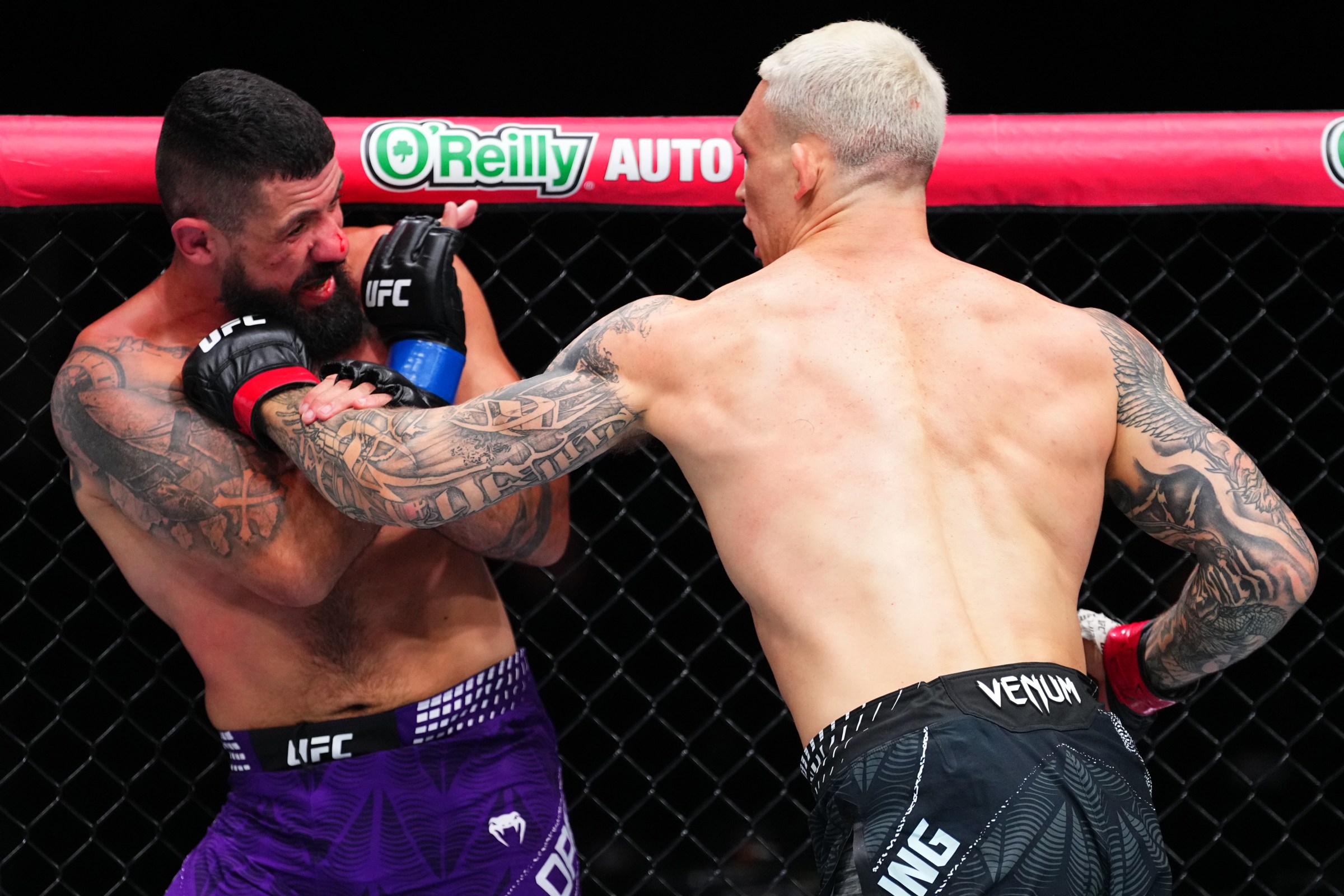 SEATTLE, WASHINGTON - MARCH 28: (R-L) Navajo Stirling of New Zealand punches Bruno Lopes of Brazil in a light heavyweight fight during the UFC Fight Night event at Climate Pledge Arena on March 28, 2026 in Seattle, Washington. (Photo by Jeff Bottari/Zuffa LLC)