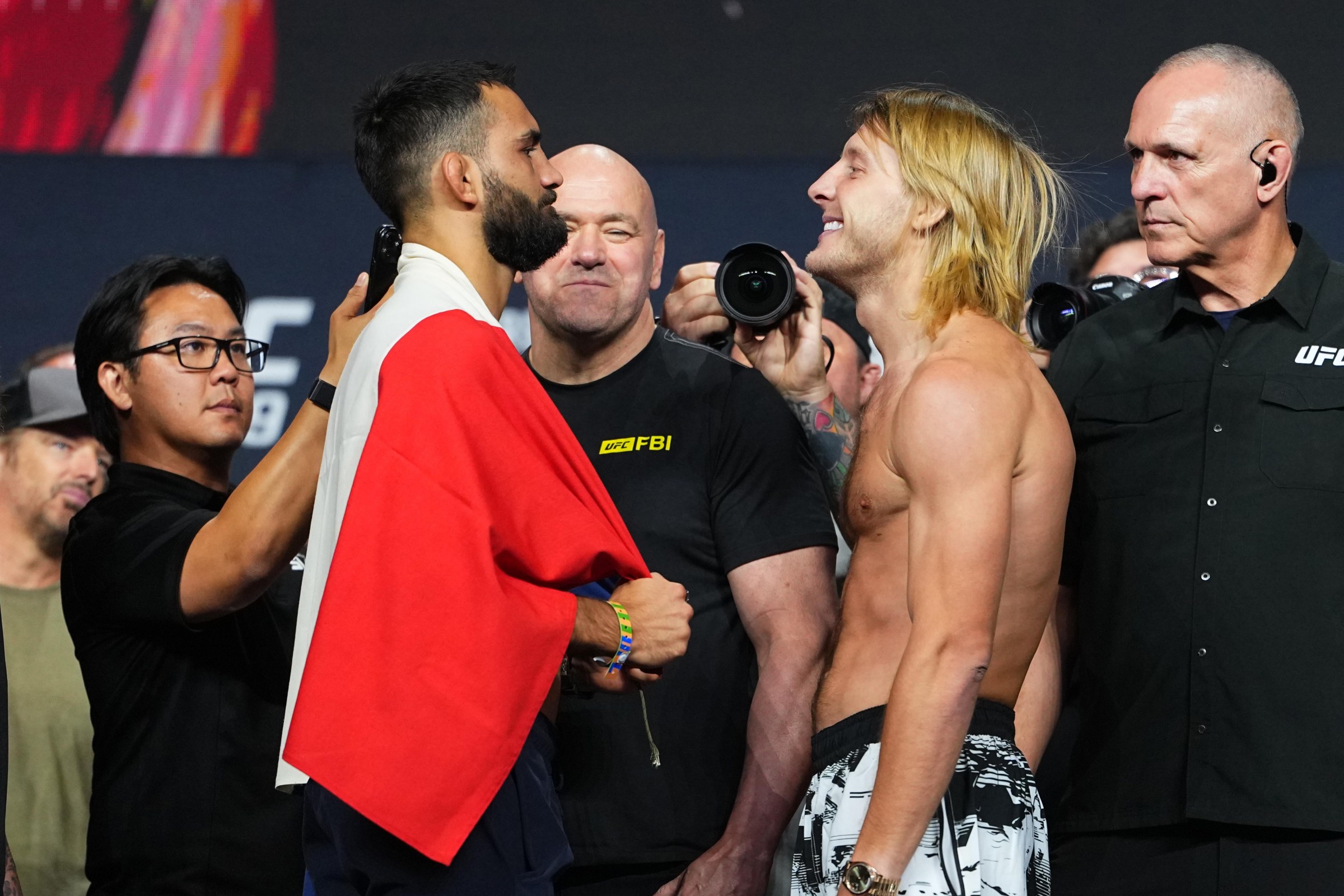LAS VEGAS, NEVADA - JULY 10: (L-R) Benoit Saint-Denis and Paddy Pimblett face off during the UFC 329 press conference at T-Mobile Arena on July 09, 2026 in Las Vegas, Nevada. (Photo by Jeff Bottari/Zuffa LLC)