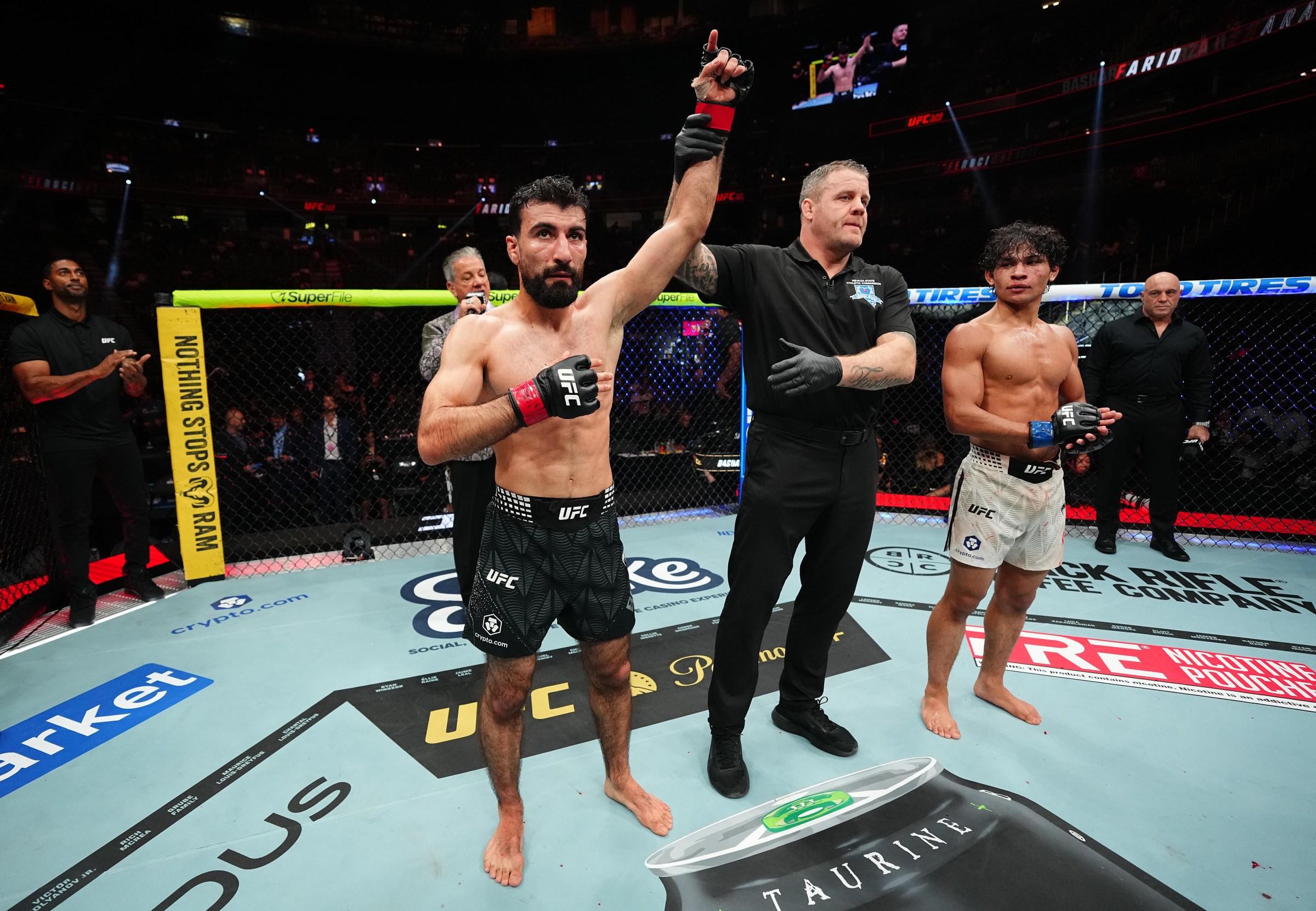LAS VEGAS, NEVADA - JULY 11: Farid Basharat of Afghanistan has his hand raised in a bantamweight fight during the UFC 329 event at T-Mobile Arena on July 11, 2026 in Las Vegas, Nevada. (Photo by Jeff Bottari/Zuffa LLC)